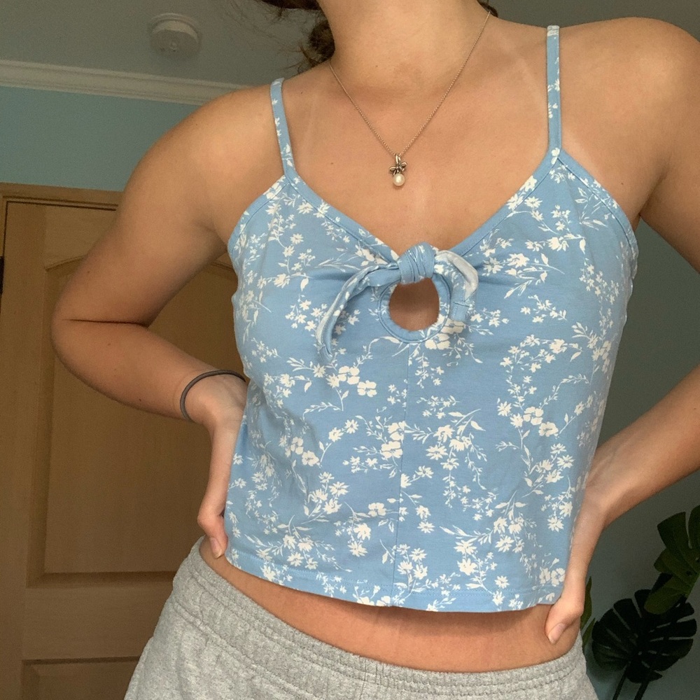 Blue tank top with flower design